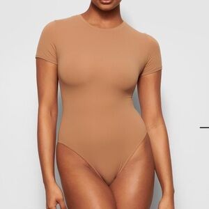 NWOT SKIMS Raw Edge Hem Thong Body Suit